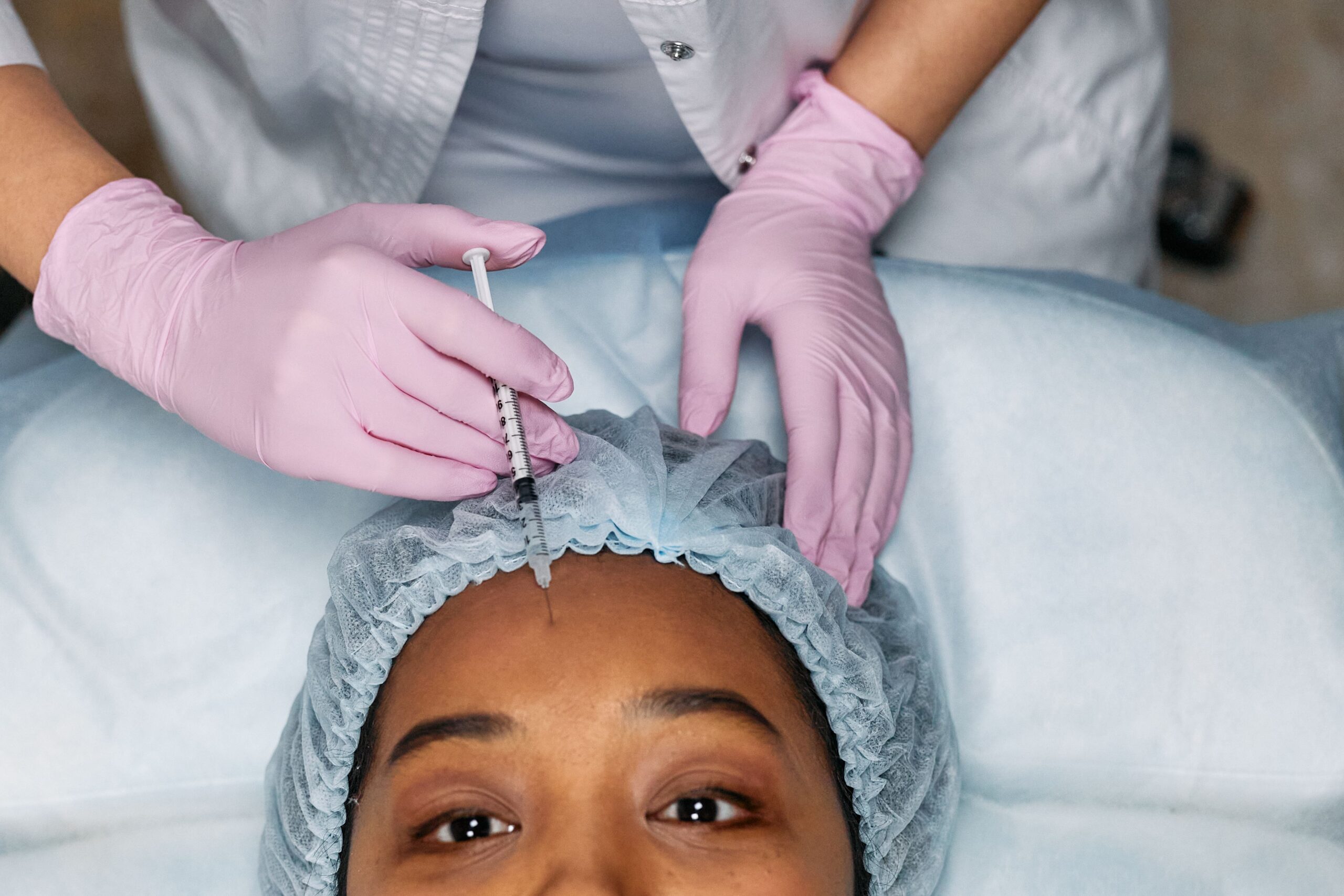 Patient receiving botox injection in medspa
