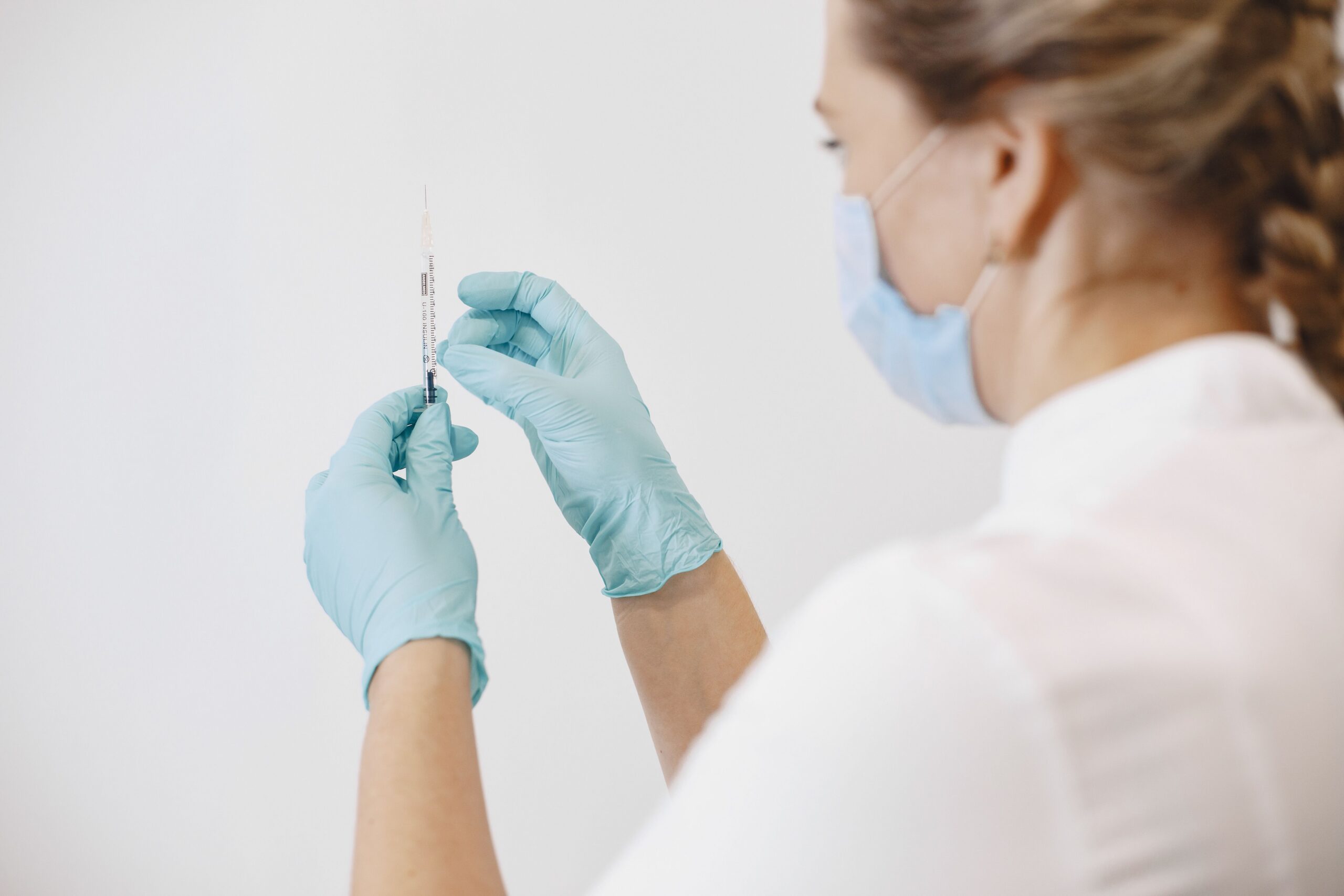 med spa practitioner holding a botox needle